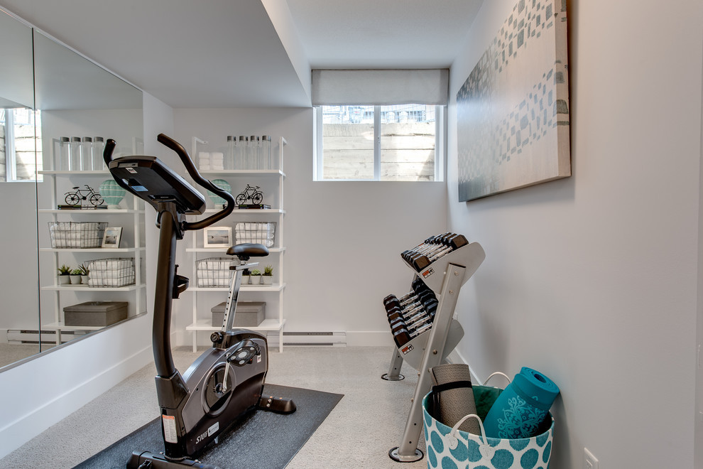 Inspiration for a small modern multi-use home gym in Vancouver.