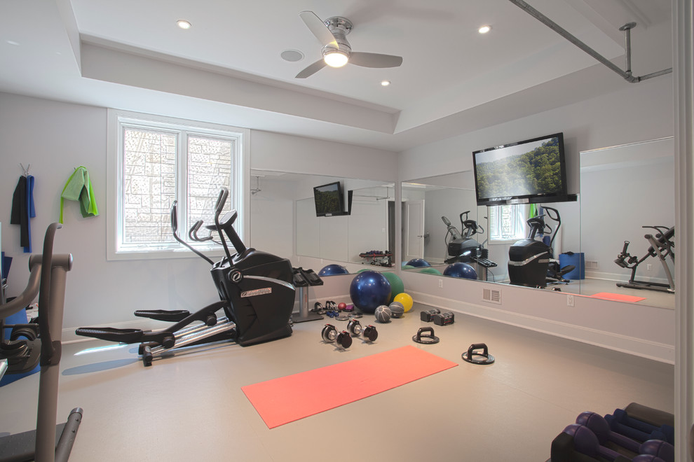 Multiuse home gym - large modern multiuse home gym idea in Detroit with beige walls