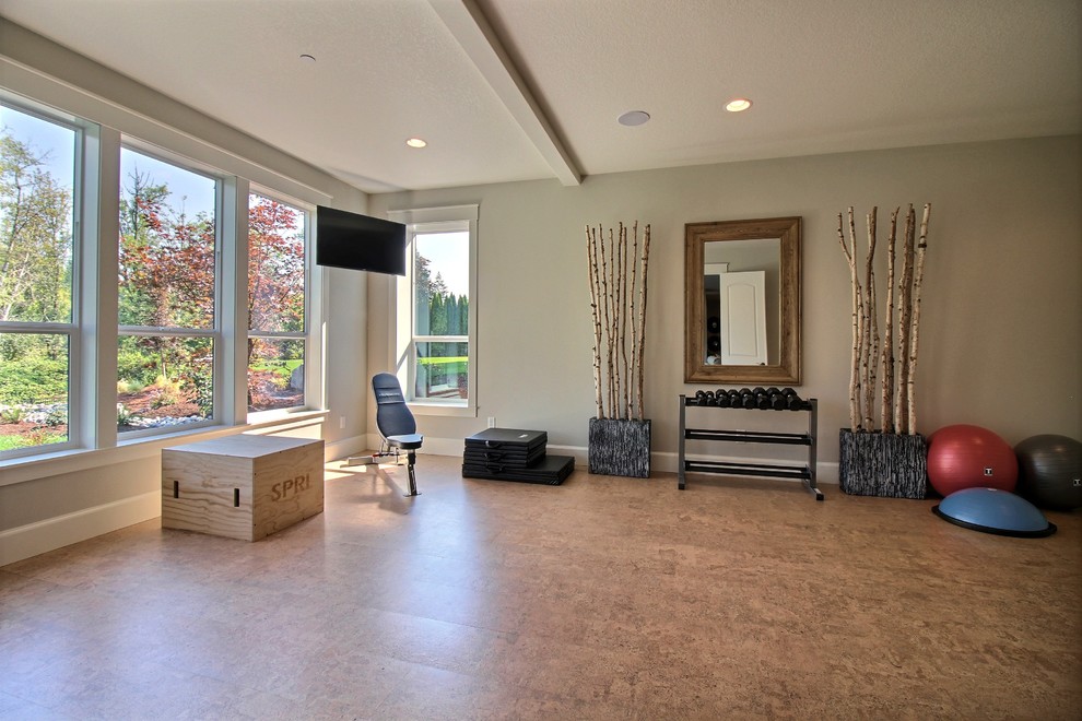 Photo of an expansive classic multi-use home gym in Portland with grey walls, cork flooring and brown floors.