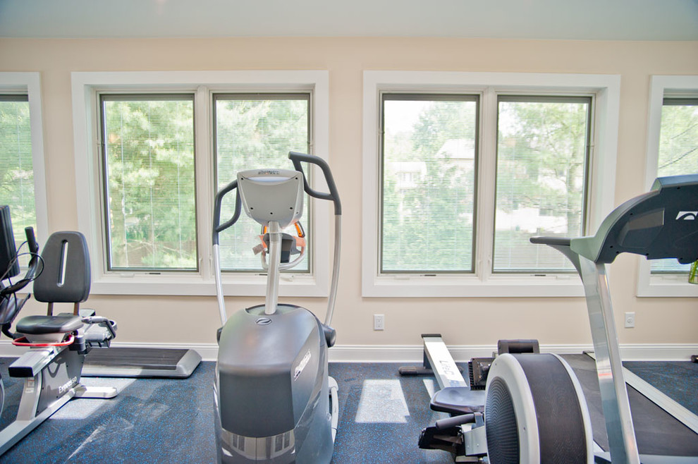 Inspiration for a large contemporary multi-use home gym in New York with white walls and concrete flooring.