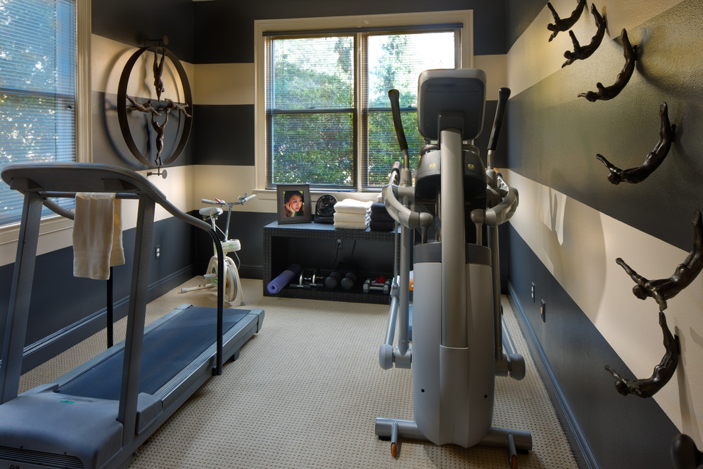 Photo of a traditional home gym in New Orleans with grey walls and carpet.