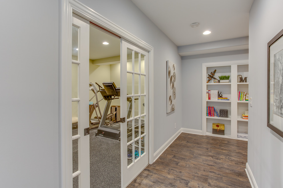 Example of a large transitional multiuse home gym design in Chicago with beige walls