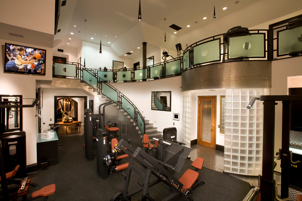 Inspiration for an expansive traditional home gym in Los Angeles with white walls, black floors and feature lighting.