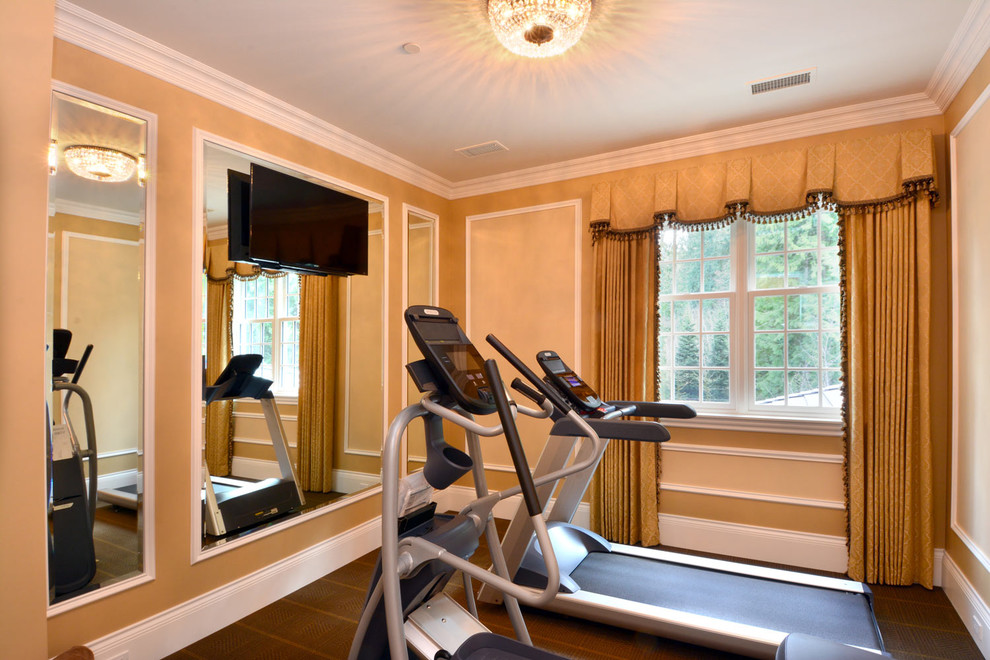 Multiuse home gym - mid-sized contemporary carpeted and brown floor multiuse home gym idea in Seattle with orange walls