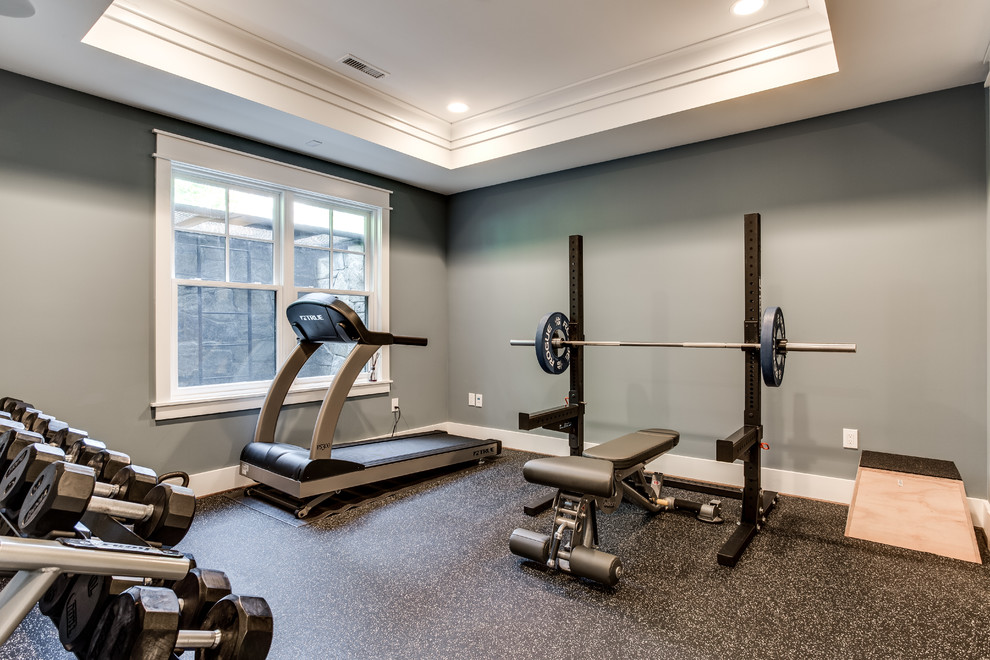 Home weight room - mid-sized craftsman home weight room idea in DC Metro with blue walls
