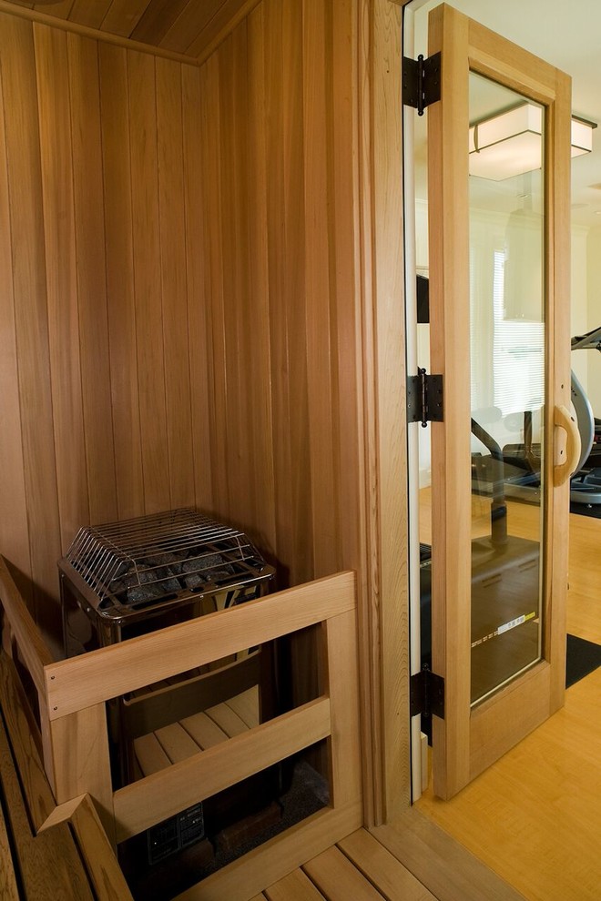 Inspiration for a mid-sized timeless bamboo floor home gym remodel in San Francisco with brown walls