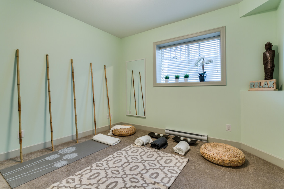 Transitional carpeted and beige floor home gym photo in Vancouver with green walls