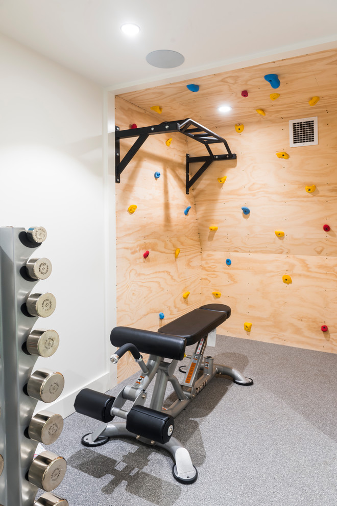 Design ideas for a contemporary home gym in Boston.