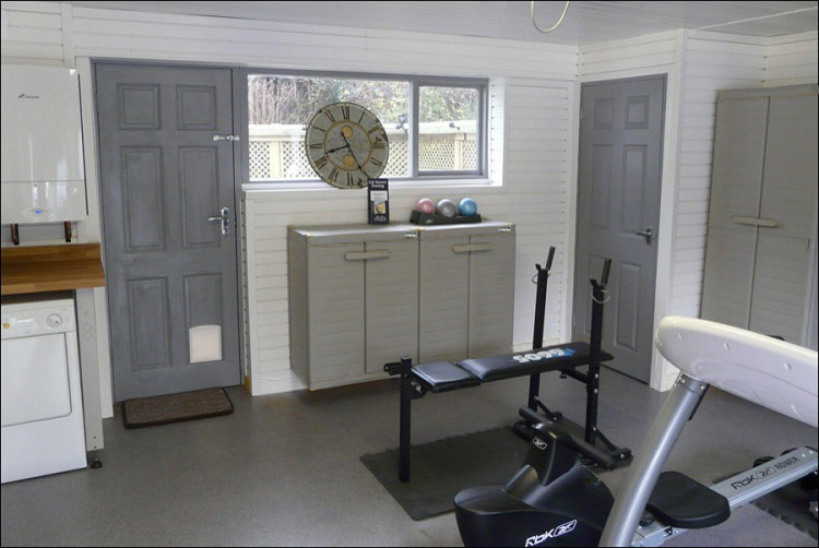 Photo of a medium sized contemporary home gym in Surrey.