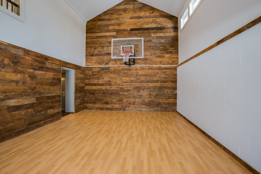 Large elegant light wood floor indoor sport court photo in Minneapolis with white walls