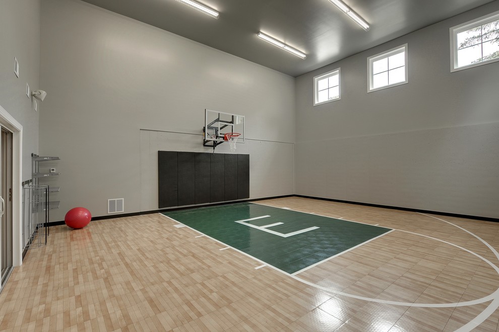 Photo of a contemporary home gym in Minneapolis with grey walls.
