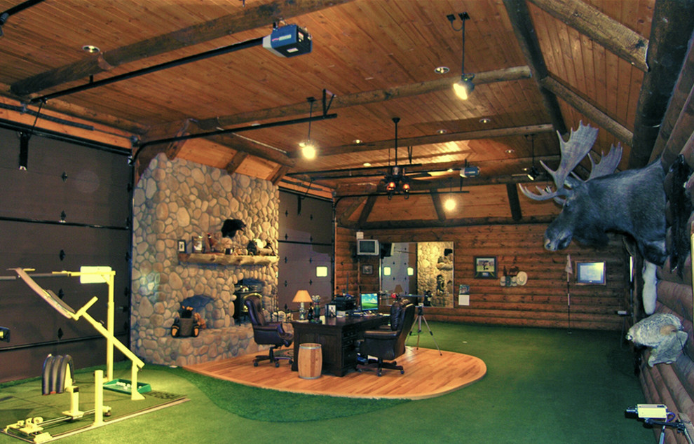 Example of a large mountain style multiuse home gym design in Denver with brown walls