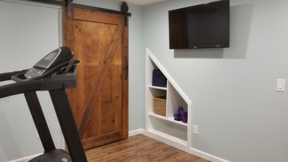 Example of a mid-sized eclectic linoleum floor multiuse home gym design in Other with blue walls