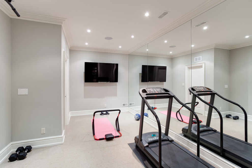 Medium sized traditional multi-use home gym in Toronto with grey walls, cork flooring and grey floors.