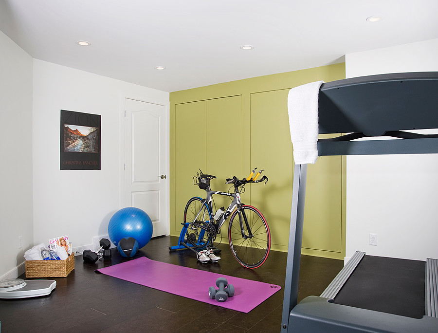 Inspiration for a contemporary home gym in Calgary with a feature wall.