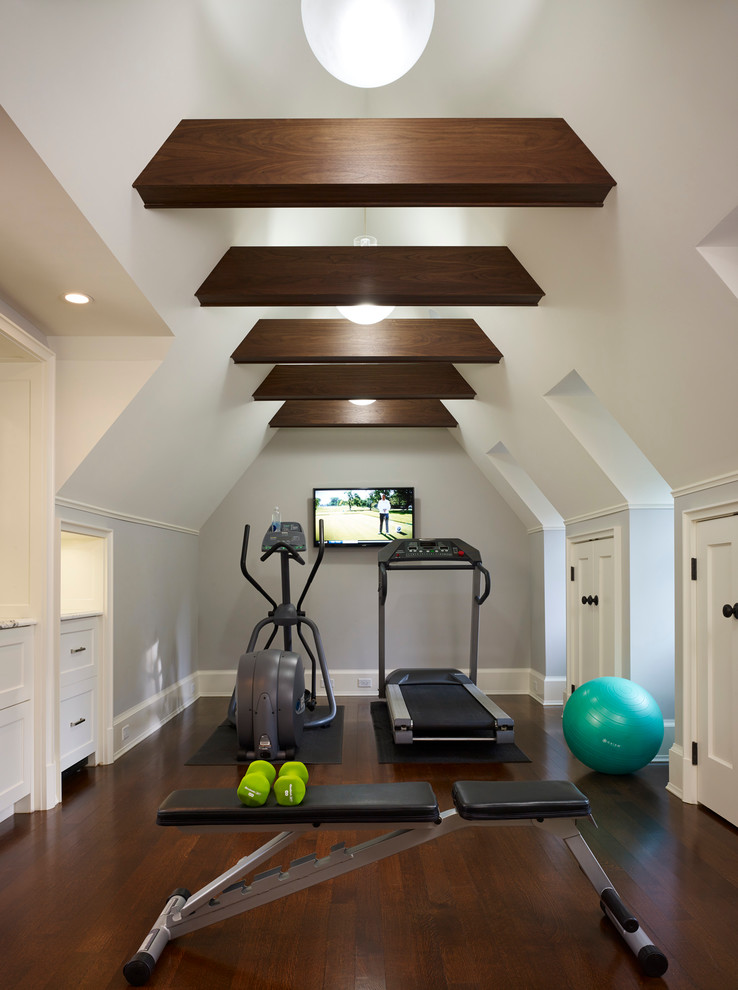 Large elegant dark wood floor multiuse home gym photo in Chicago with gray walls