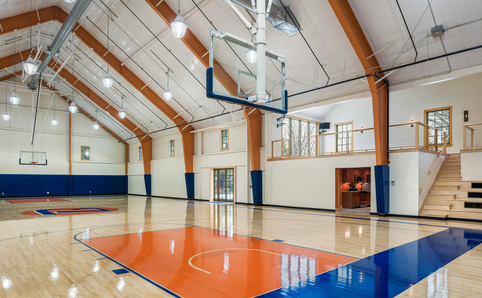 Design ideas for an expansive traditional indoor sports court in Philadelphia with white walls and light hardwood flooring.