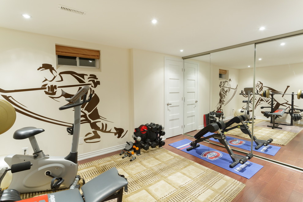 Inspiration for a medium sized contemporary home weight room in Toronto with white walls and dark hardwood flooring.