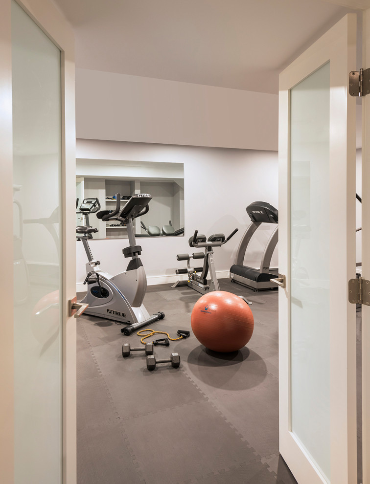 Photo of a modern home gym in Boston.