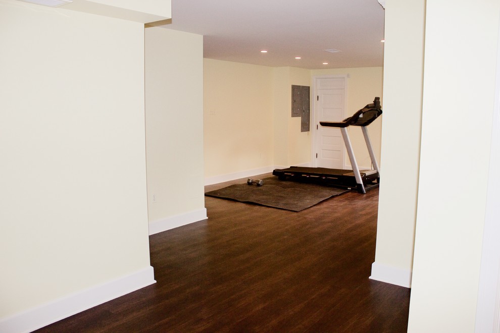 Multiuse home gym - mid-sized craftsman dark wood floor multiuse home gym idea in Chicago with beige walls