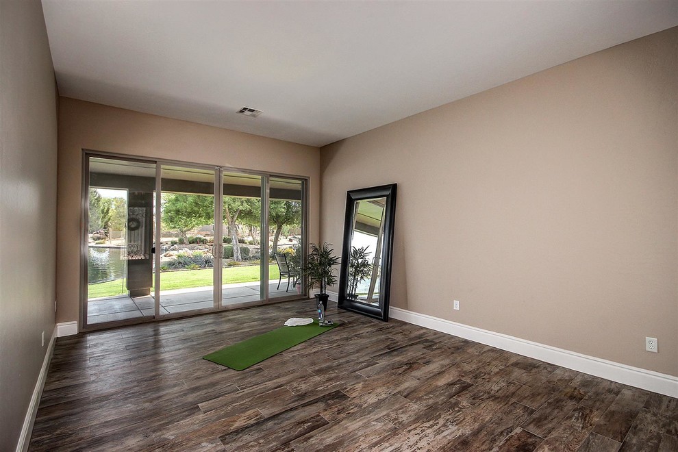Multiuse home gym - large transitional porcelain tile multiuse home gym idea in Phoenix with beige walls