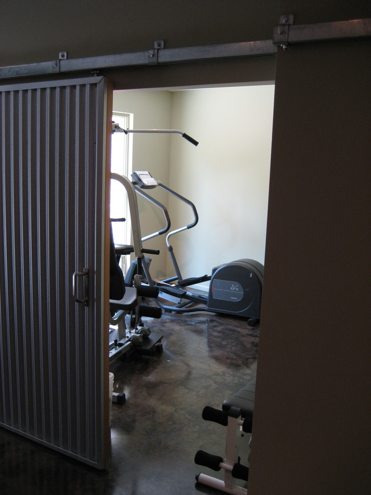 Design ideas for a contemporary home gym in Indianapolis.
