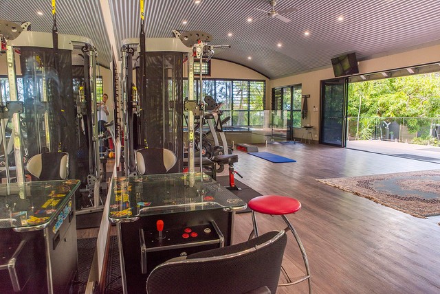 NEW BUILD Gym Studio Rehabilitation Pool Playroom Interior Pool Tropical Home Gym Sunshine Coast by Adrian Ramsay Design House Houzz UK