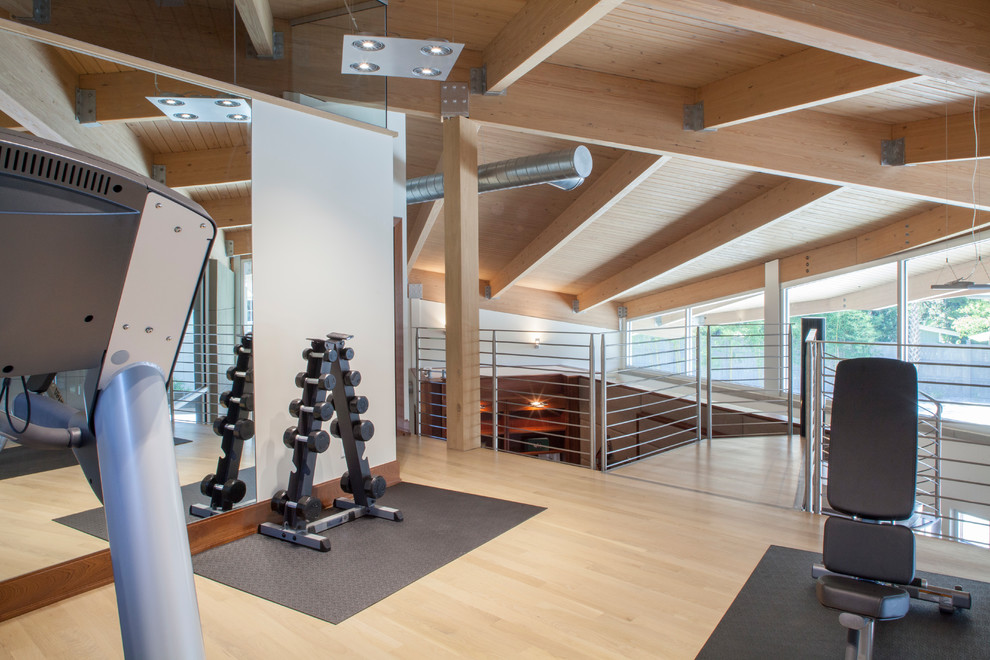 Mid-sized trendy light wood floor and beige floor home weight room photo in Jacksonville with white walls