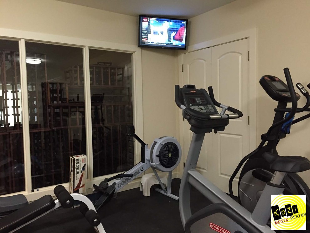 This is an example of a mediterranean home weight room in Other.