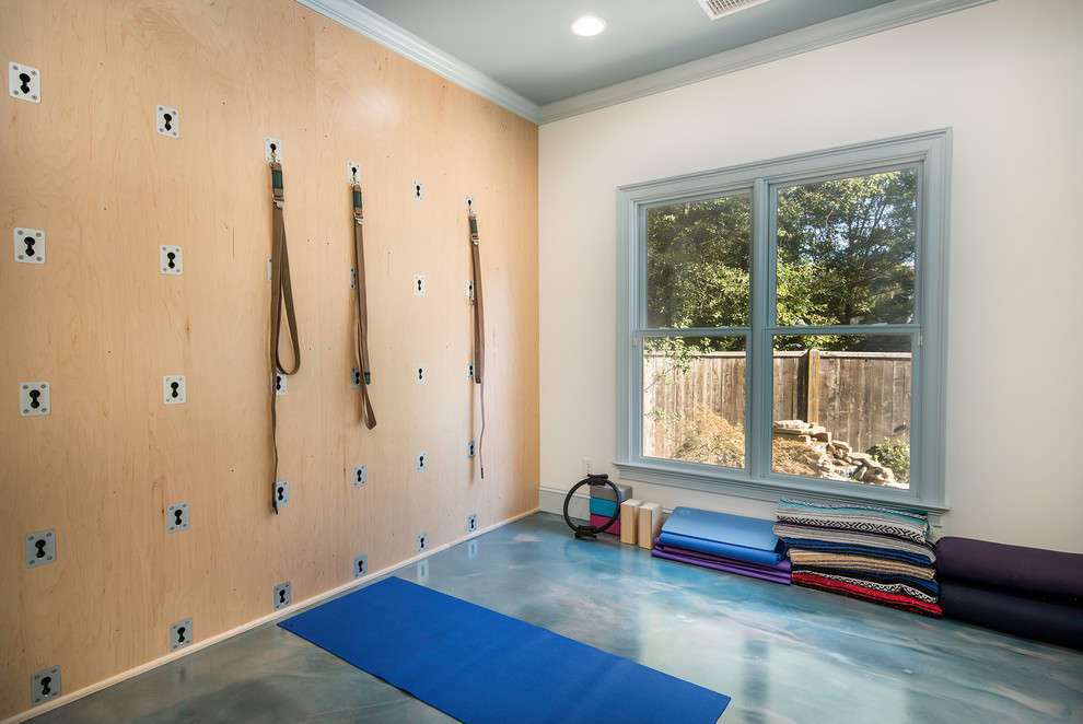 Inspiration for a small coastal concrete floor and blue floor home gym remodel in Atlanta