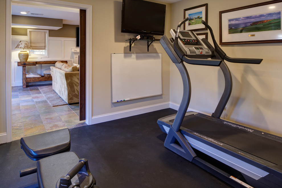 Example of a mid-sized transitional home weight room design in DC Metro with beige walls