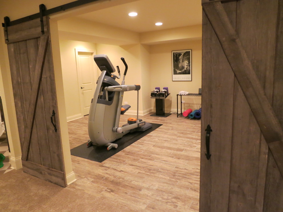 Photo of a medium sized rustic multi-use home gym in Chicago with ceramic flooring.