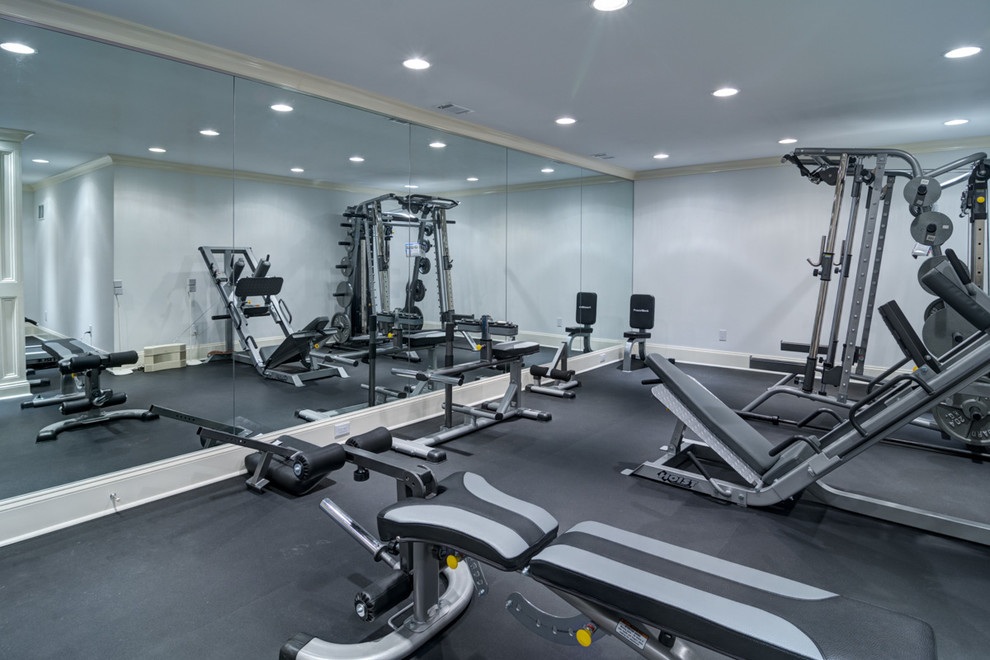 Large transitional home weight room photo in Atlanta with white walls