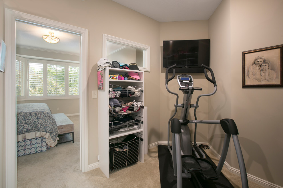 Multiuse home gym - mid-sized traditional carpeted and beige floor multiuse home gym idea in Minneapolis with brown walls