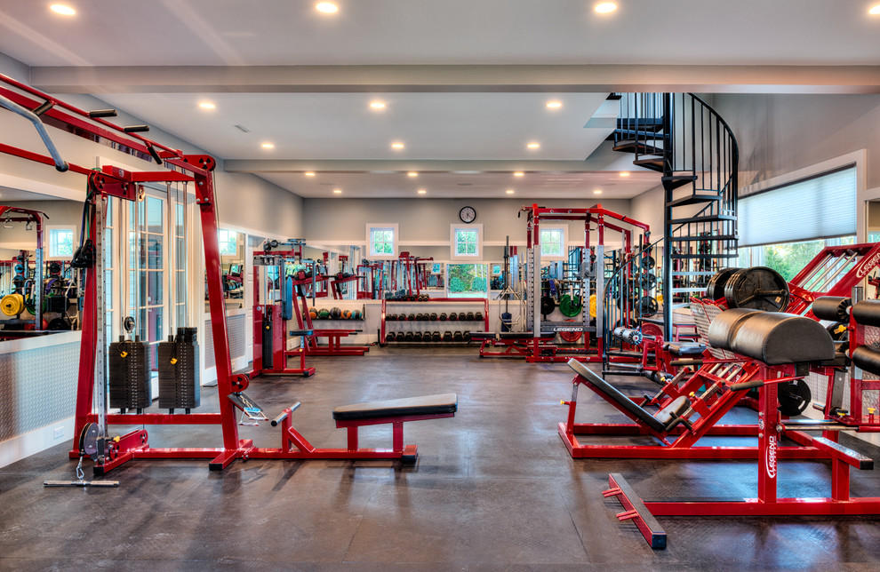Inspiration for an expansive traditional home gym in Other with grey walls and grey floors.