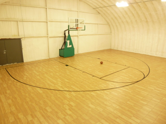 Gallery of backyard court and home gym installations featuring SnapSports