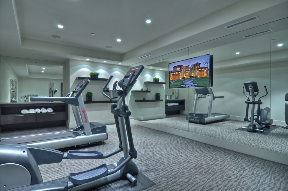 Trendy carpeted home gym photo in Orange County with gray walls