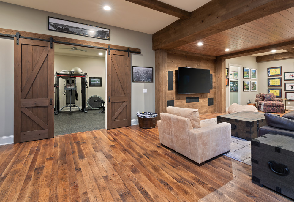 Inspiration for a mid-sized timeless carpeted and gray floor multiuse home gym remodel in Cincinnati with beige walls
