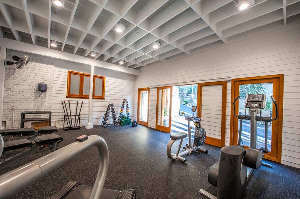 Inspiration for a mid-sized contemporary vinyl floor multiuse home gym remodel in Los Angeles with white walls