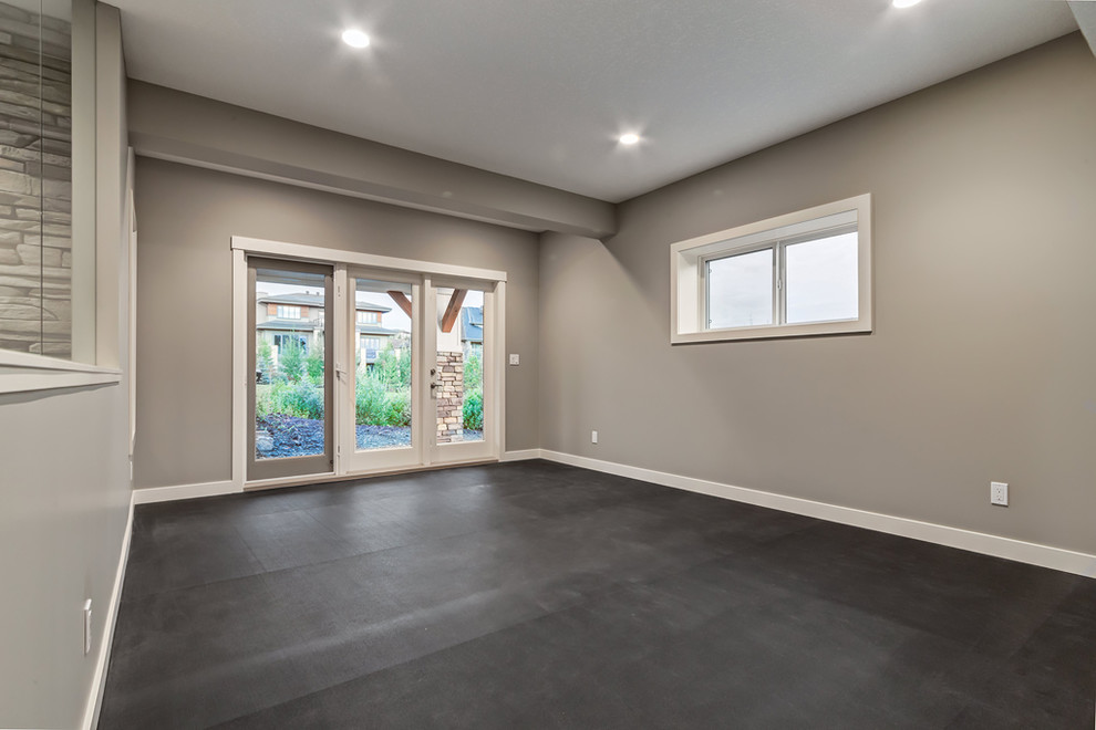 Inspiration for a transitional multiuse home gym remodel in Calgary with gray walls