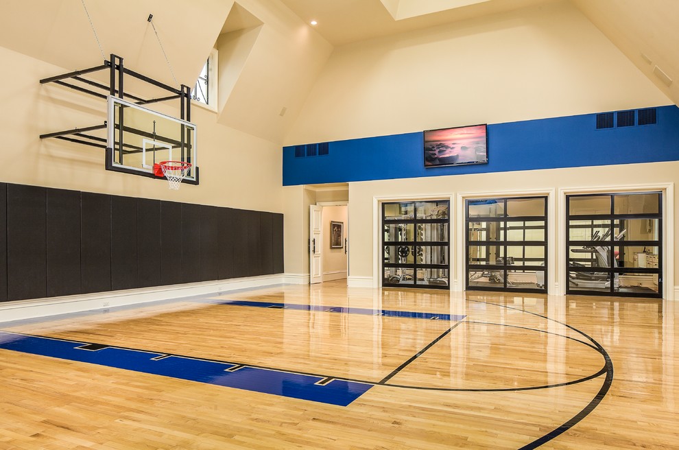 Indoor sport court - huge transitional light wood floor indoor sport court idea in Dallas