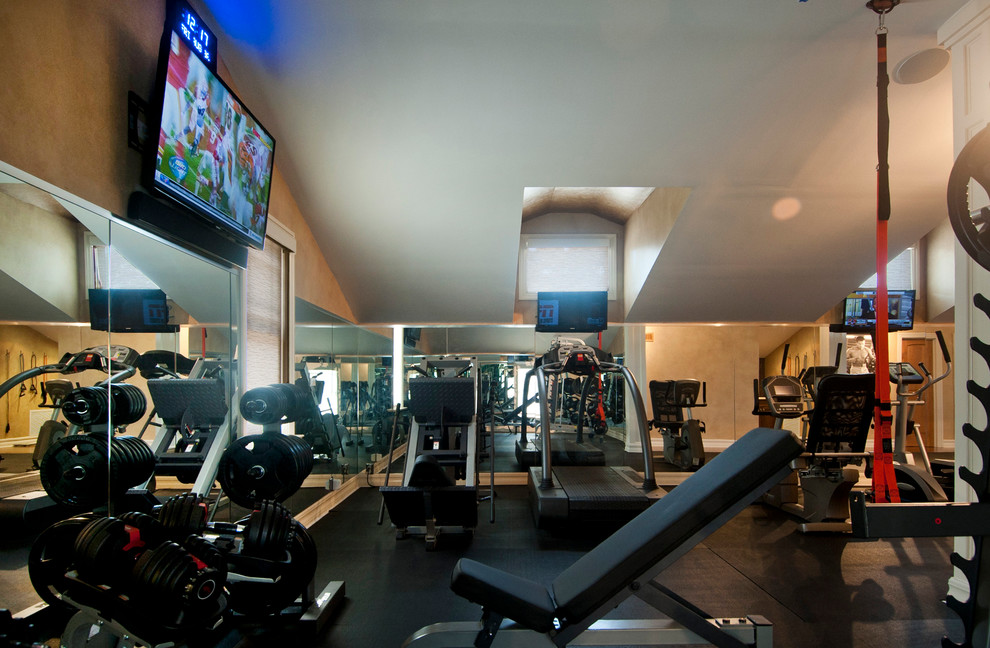 Photo of a large classic multi-use home gym in Tampa with beige walls.