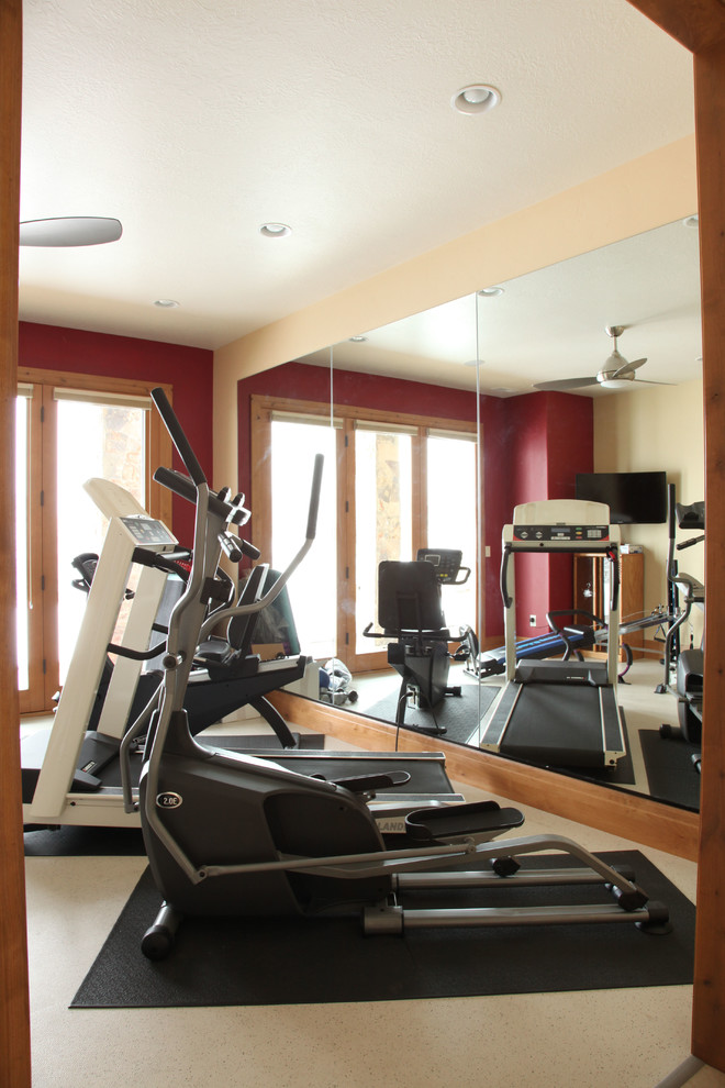Design ideas for a large traditional home weight room in Salt Lake City with red walls.