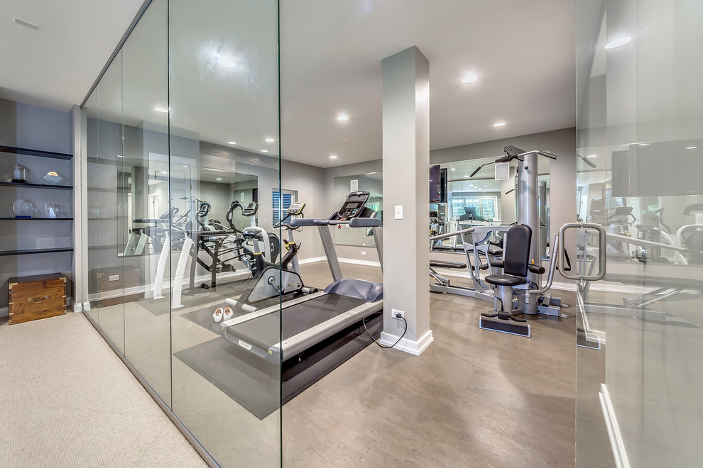This is an example of a multi-use home gym in Chicago with grey walls.