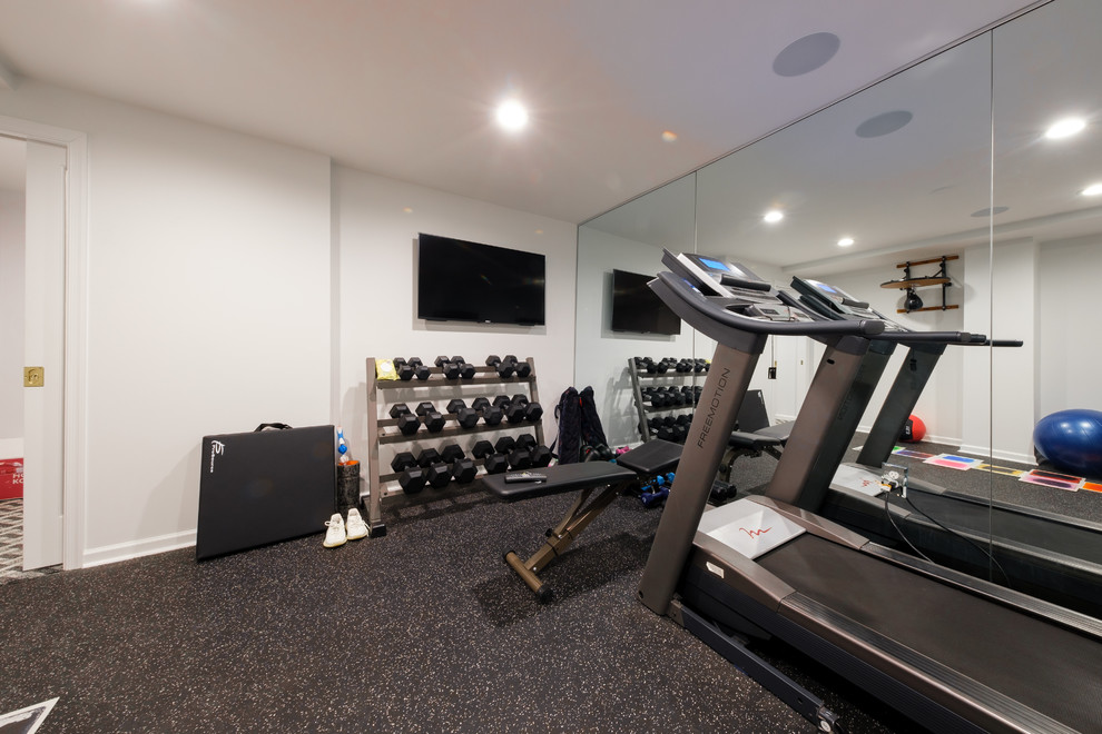 This is an example of a medium sized traditional multi-use home gym in Philadelphia with grey walls, grey floors and cork flooring.