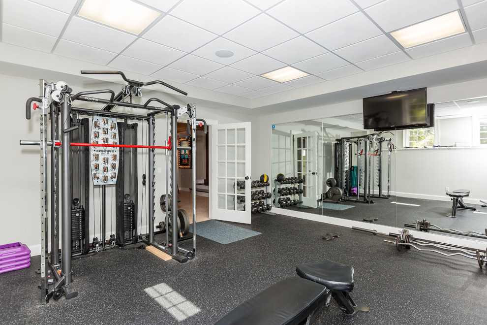 Photo of a contemporary home gym in Boston.