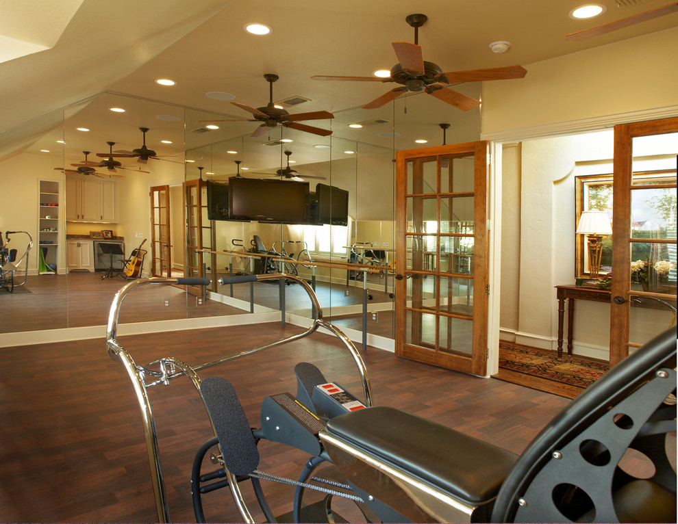 Multiuse home gym - traditional linoleum floor multiuse home gym idea in Dallas with beige walls