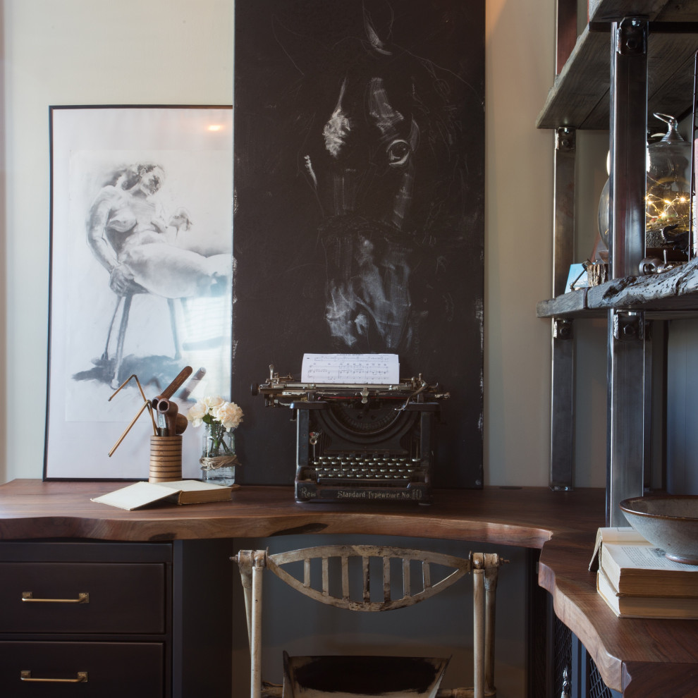This is an example of a bohemian study in Vancouver with grey walls, no fireplace and a built-in desk.