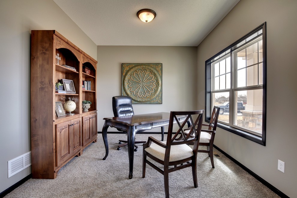 Mid-sized elegant carpeted home office photo in Minneapolis with gray walls