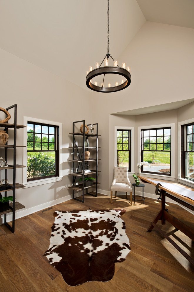Inspiration for a transitional freestanding desk light wood floor study room remodel in New York with no fireplace